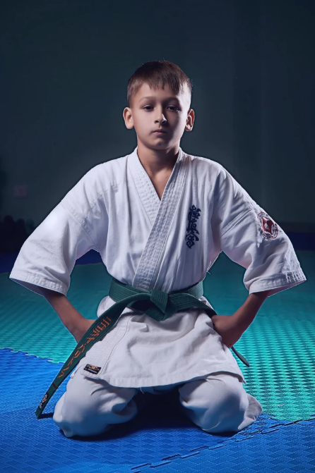 Young karate student in seiza posture